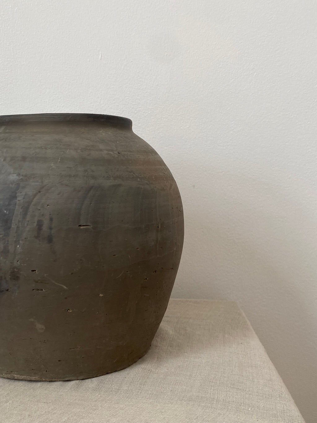 Eira Antique Terracotta Clay Pot on a linen cloth