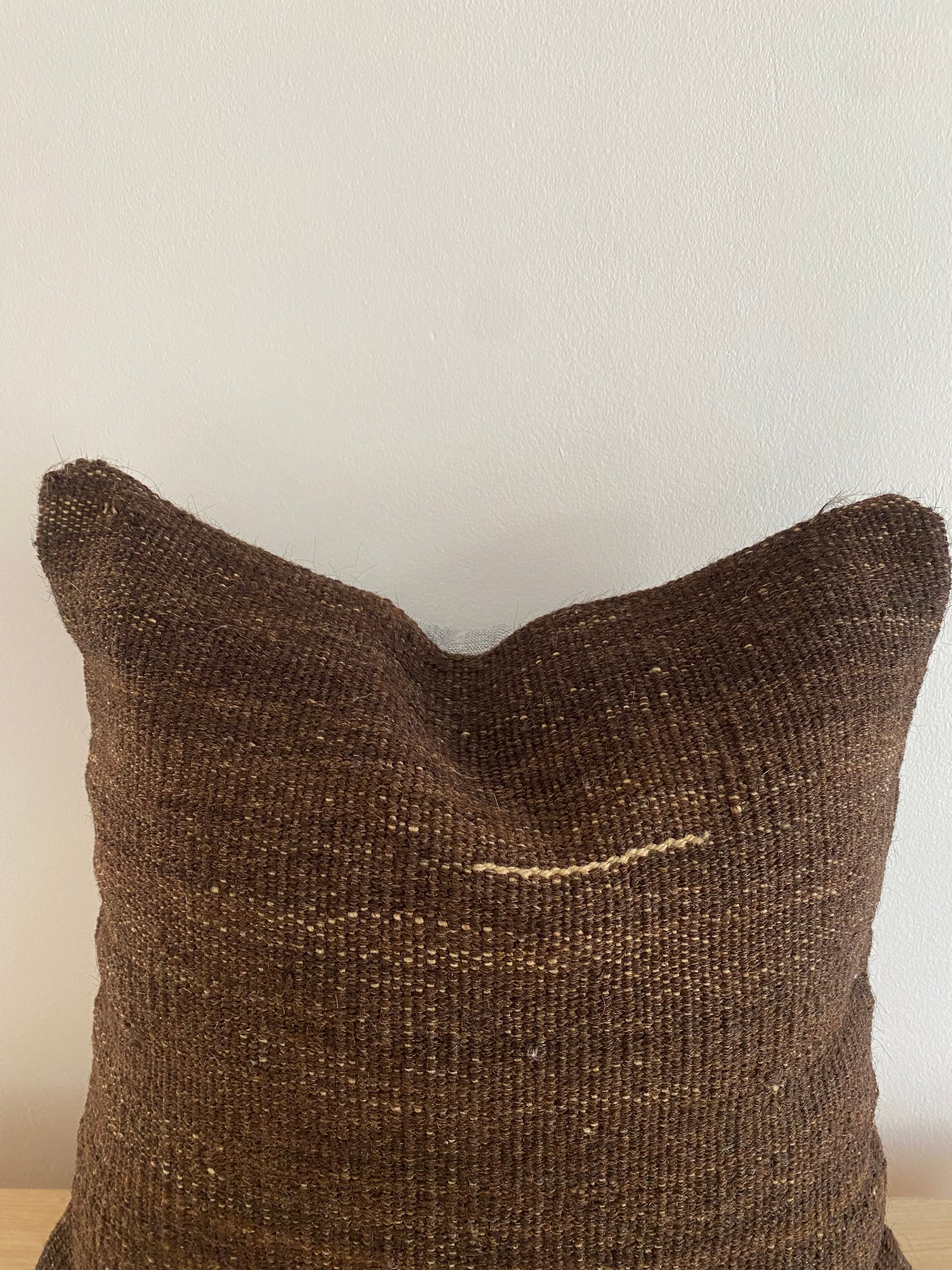 Textured brown Turkish Kilim Pillow Cover_pillow on a white background