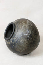 Dark Brown terracotta clay pot on a white background