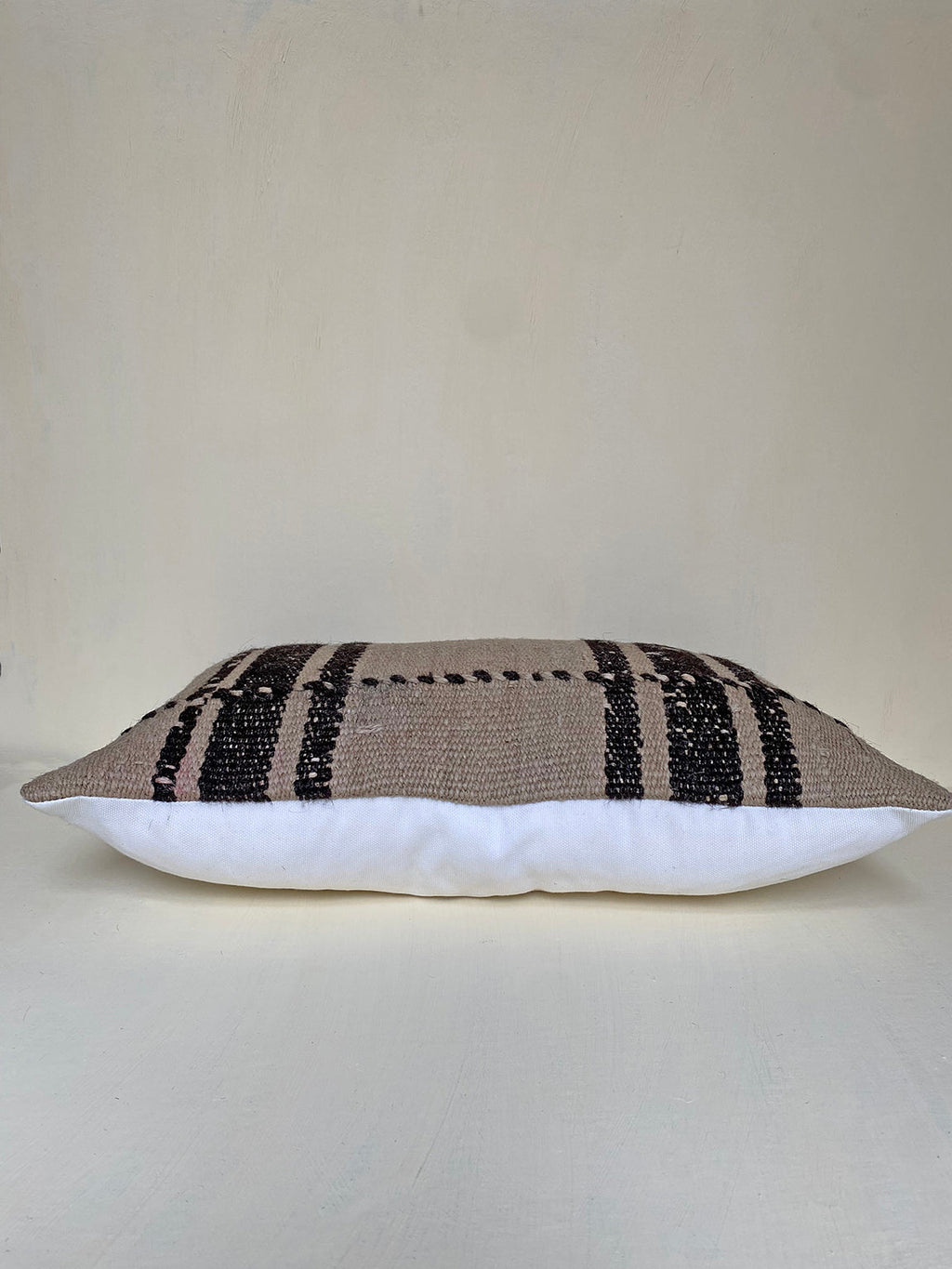 Kilim Striped Pillow Cover on cream background