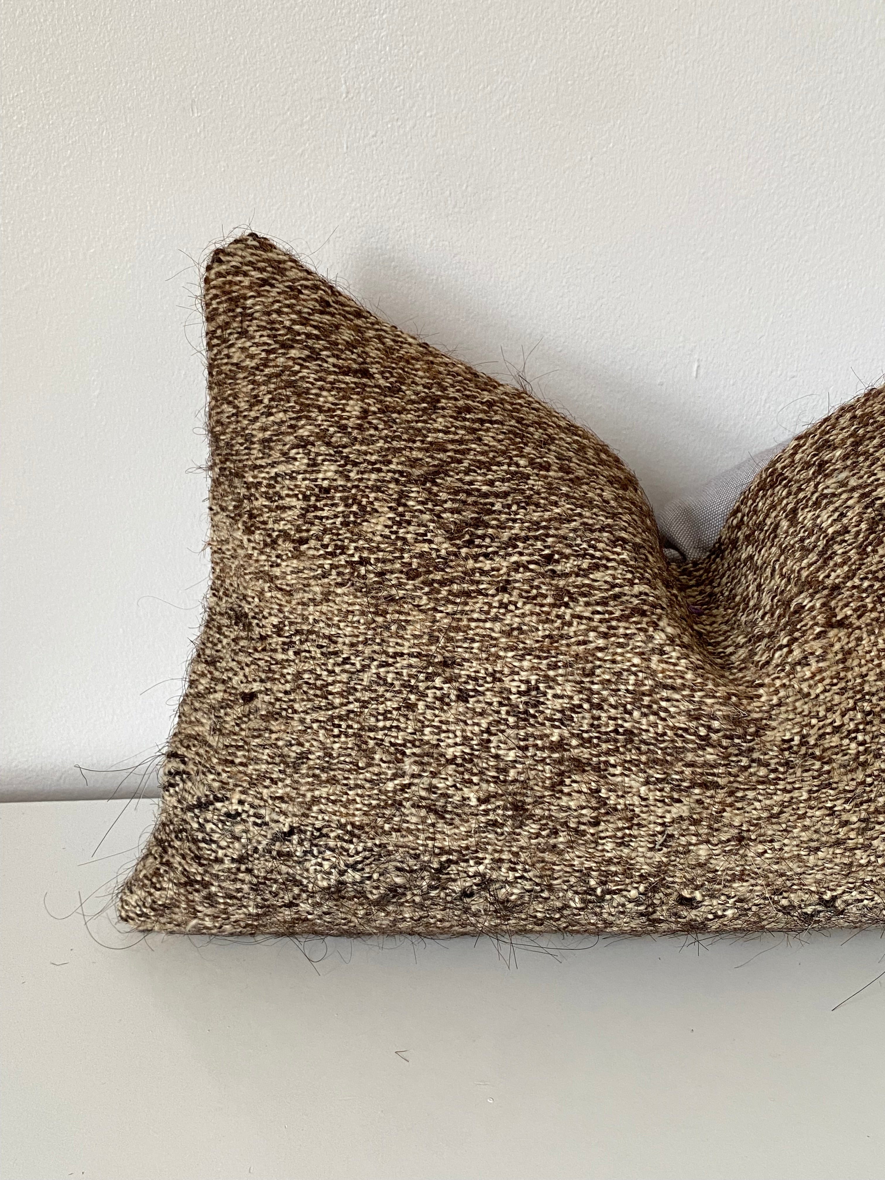 Textured brown Turkish Pillow cover fabric swatch on a white background