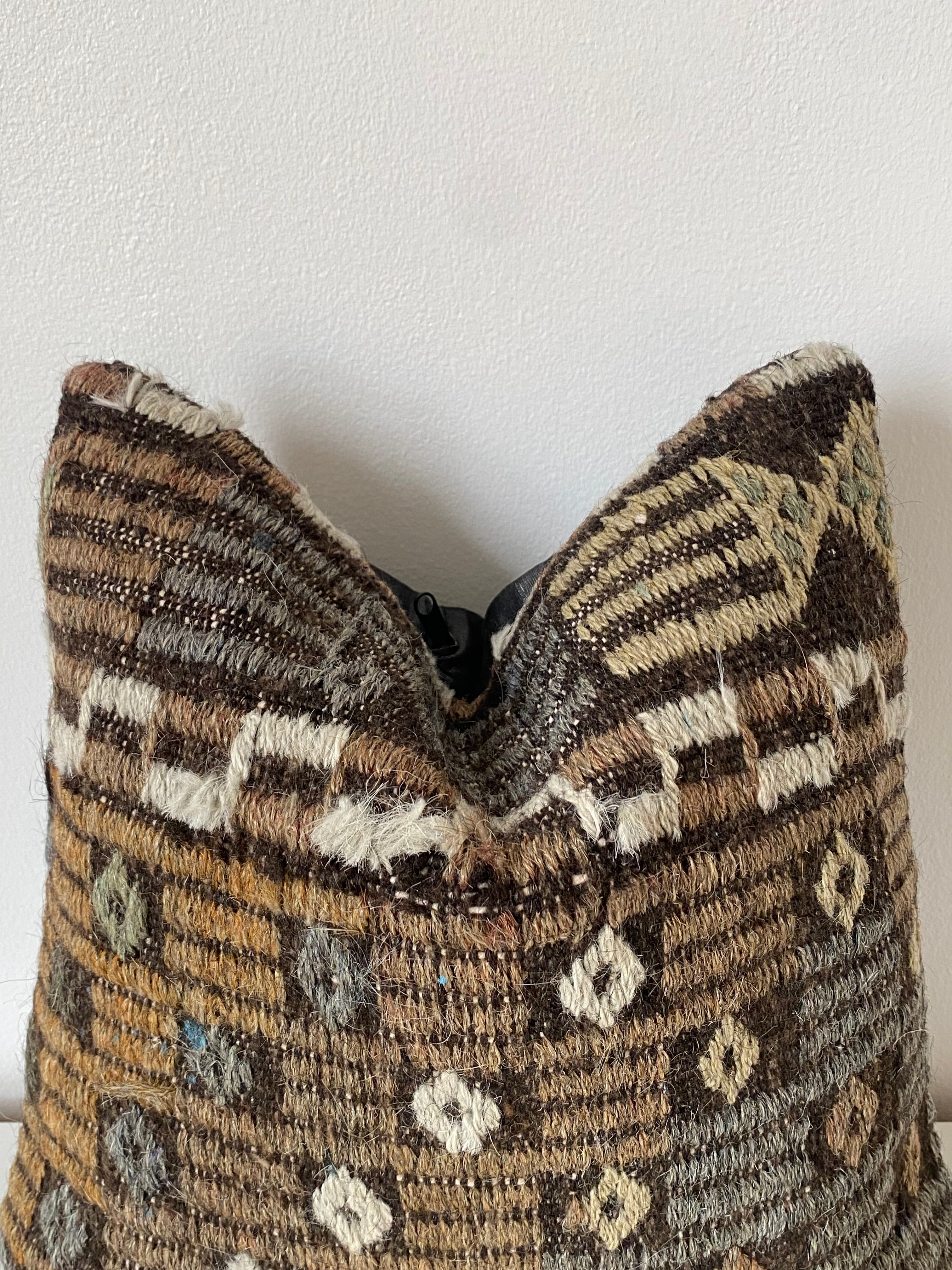 Textured Turkish Kilim pillow cover with geometric pattern on a white background