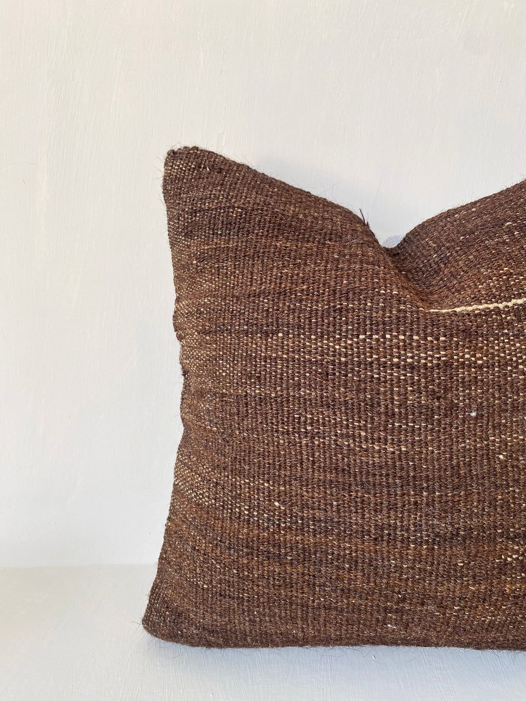 Dark brown vintage Turkish Kilim Pillow cover made from handwoven wool, perfect for rustic interiors, earthy tones, and minimalist home decor.