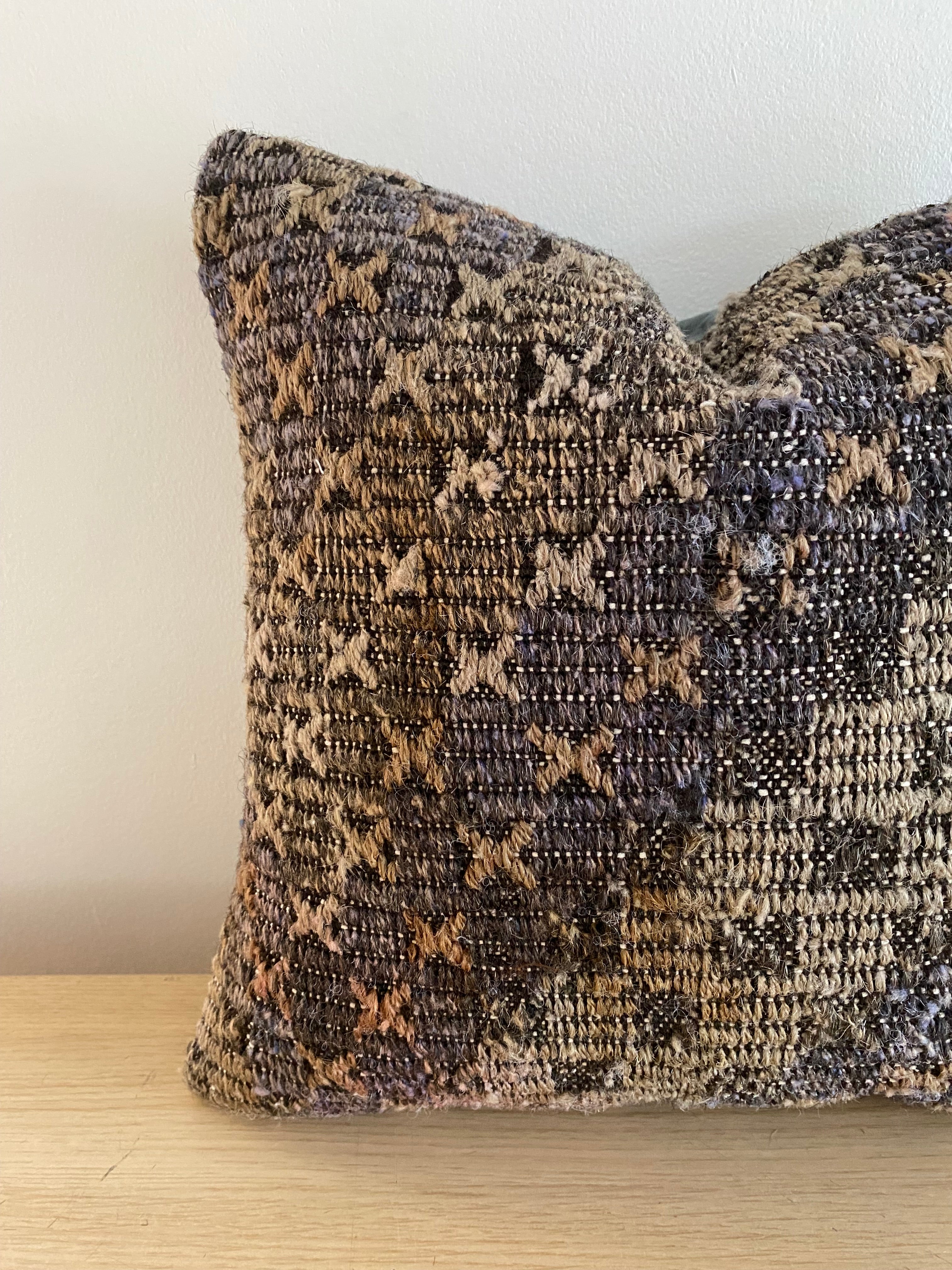 Textured Turkish pillow cover with a geometric pattern on a light background